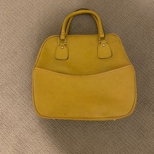 Vintage mustard bowling bag